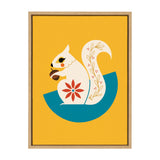Stylized white squirrel holding an acorn with red floral pattern on its body, set against a mustard yellow background with a teal semi-circle beneath it, framed in light wood.
