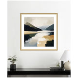 Abstract landscape painting featuring a reflective lake between dark mountains with soft beige and gray sky, framed in light wood and hung above a black console table.