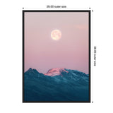 Framed canvas showing a full moon rising over dark blue Icelandic mountains under a pastel pink sky, with mountain peaks highlighted by soft light.