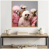 Framed canvas of four dogs styled as glamorous women, each wearing sunglasses and vintage-inspired pink or floral outfits, with various fluffy white hairstyles.