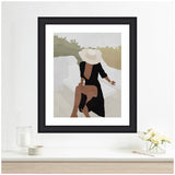 Minimalist framed art of a woman in a black dress and wide-brimmed hat sitting on an outdoor bench with muted green and beige background.