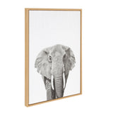 Framed canvas showing a detailed grayscale drawing of an elephant's face and front legs on a white background, with a light wooden frame.