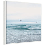 Sylvie Ocean Swim 2 Square framed canvas art depicting a beach scene by Stephanie Klatt