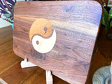 Walnut charcuterie board with Cherry and Maple Yin Yang wood inlay, handcrafted serving board