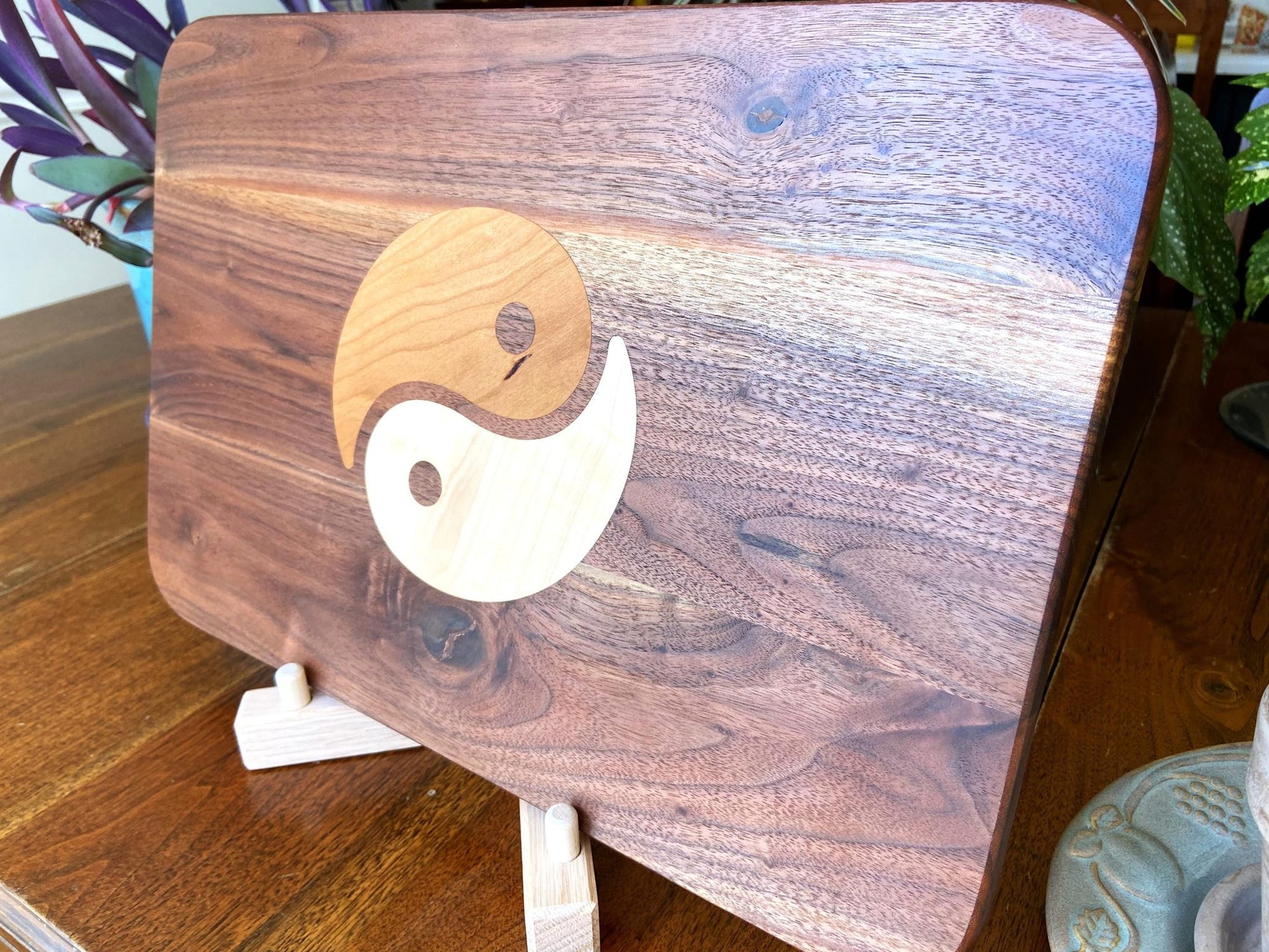 Walnut charcuterie board with Cherry and Maple Yin Yang wood inlay, handcrafted serving board