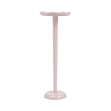 Tall, slim, pink pedestal drink table with scalloped edges on top and a rounded base, shown against a white background.