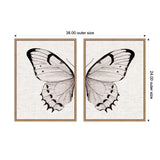 Two-piece framed canvas art set showing opposite halves of a monochrome butterfly wing with black accents on a neutral linen background, 38 by 24 inches total size.
