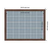 Rectangular pinboard with a dark wood frame and light blue plaid fabric, featuring white grid lines and labeled inner and outer dimensions in inches.