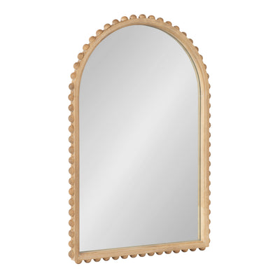 Beadbrook Arched Wall Mirror with a beaded, solid wood frame in Rustic Brown hung on a white wall