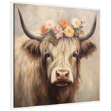 Framed canvas featuring a close-up portrait of a light brown Highland cow wearing a colorful flower crown against a soft, neutral background.