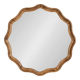 Hatherleigh Round Scallop Mirror with scalloped edges and a thick wooden frame in Rustic Brown, hanging on a wall
