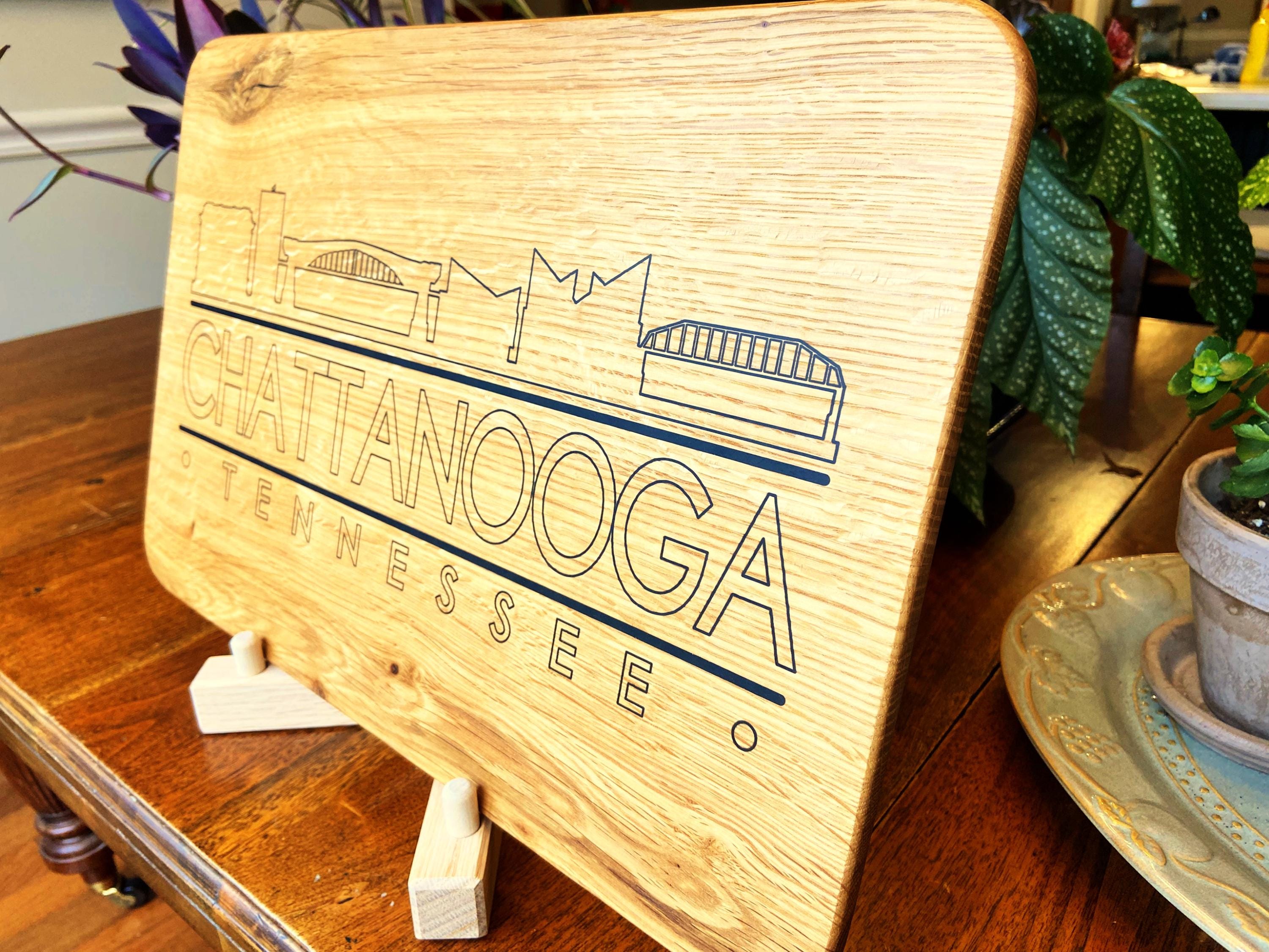 Handmade white oak charcuterie board with engraved Chattanooga skyline