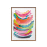 Abstract art print with layered curved brushstrokes in pink, orange, blue, green, and yellow, accented with delicate white dots, framed in light wood.