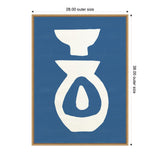 Minimalist abstract art with white ceramic shapes resembling a bowl and vase on a solid blue background, framed in a thin wooden frame.