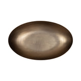 Oval-shaped metal bowl with smooth bronze finish and subtle gradient lighting highlighting its shallow concave interior.