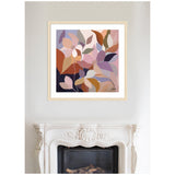 Framed abstract art above fireplace featuring layered botanical shapes in shades of mauve, rust, pink, and cream with a natural wood frame.
