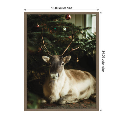 Sylvie Framed Canvas Reindeer Sitting Under a Christmas Tree by Michael Schauer