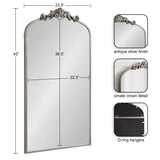 Tall rectangular wall mirror with arched top, antique silver frame, ornate crown detail, and D-ring hangers, measuring 42 by 23.5 inches with a 38.5 by 22.5 inch reflective surface.