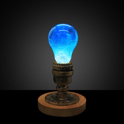 EP Light Memory Resin LED Bulb handcrafted with eco-friendly resin, shown with wooden base options