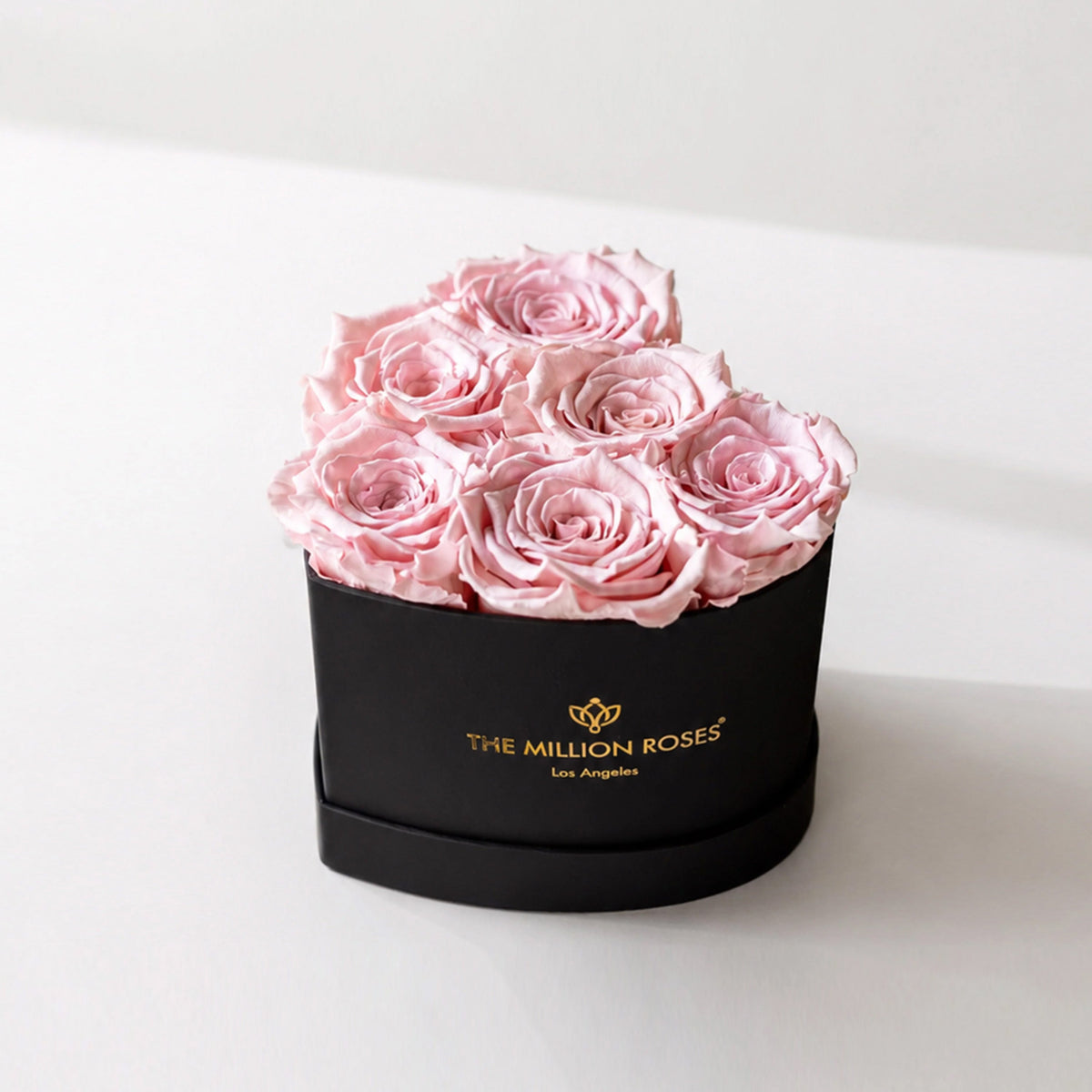 Baby Heart Black Box with Light Pink Roses arranged in a heart shape inside a black box