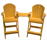 Pair of yellow Tete-a-Tete wooden chairs connected by a small rectangular table, with slatted, rounded backs and wide armrests.