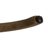 Close-up of a curved brown metal handle with a textured matte finish and rounded black end cap