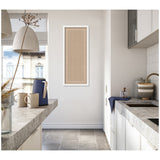 Tall rectangular beige pinboard with white scalloped edge trim mounted on a white wall in a modern kitchen with gray stone countertops.