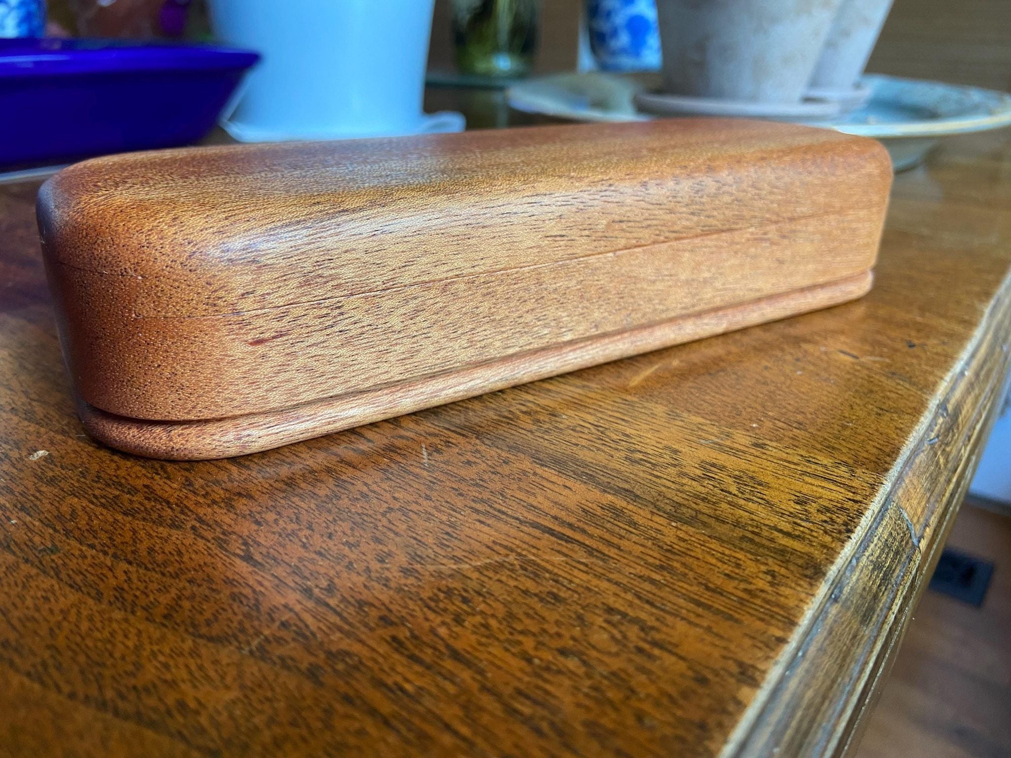 Handcrafted mahogany keepsake box with sliding dovetail joinery and beaded bottom detail