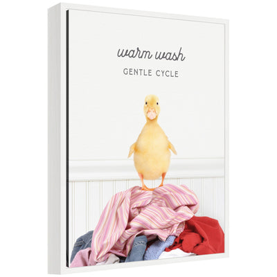Framed canvas art titled Sylvie Ducky Warm Wash Gentle Cycle Laundry by Amy Peterson showing duck and laundry care symbols