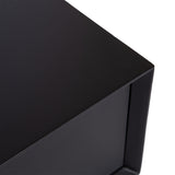 Close-up of the sharp corner of a sleek black McCutcheon Floating Console Table showcasing its smooth matte finish and modern minimalist design.