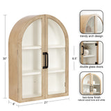 Tall wooden wall cabinet with arched top, double glass doors, black handles, and white interior shelving, featuring a natural wood tone and white two-tone finish.
