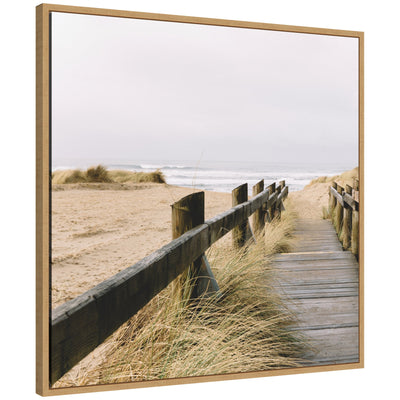 Framed canvas print of a boardwalk through coastal beach grass leading to the ocean