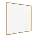 Square blank white canvas in a simple natural wood frame viewed at an angle, highlighting its smooth surface and clean lines.