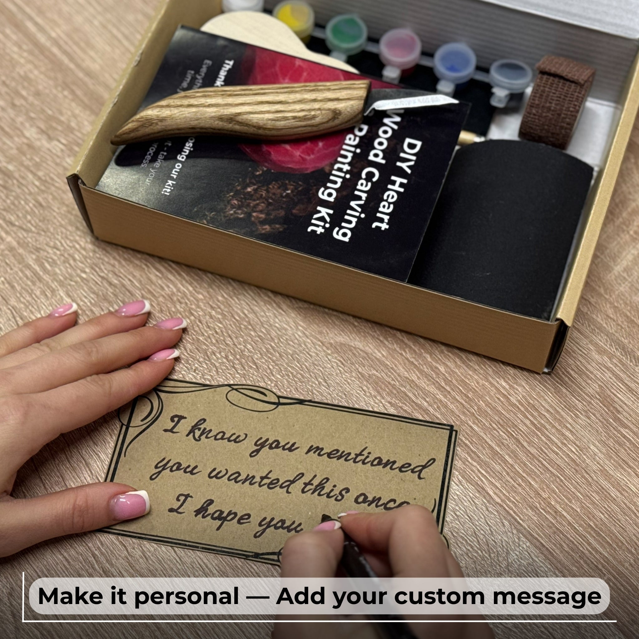 Beginner Heart Wood Carving and Painting Kit with tools and paints laid out