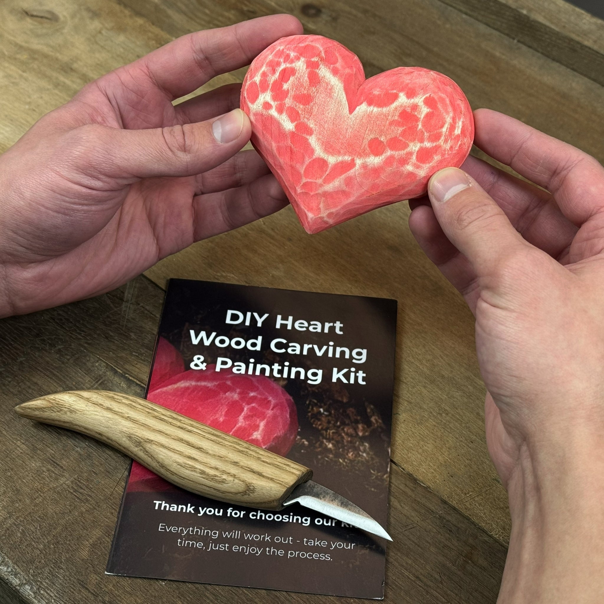 Beginner Heart Wood Carving and Painting Kit with tools and paints laid out
