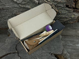 Beginner’s Spoon Carving Kit with sloyd knife, hook knife, wooden blank, sandpaper, sharpening board, pencil, and finger wrap