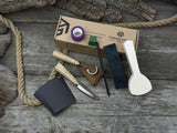 Beginner’s Spoon Carving Kit with sloyd knife, hook knife, wooden blank, sandpaper, sharpening board, pencil, and finger wrap