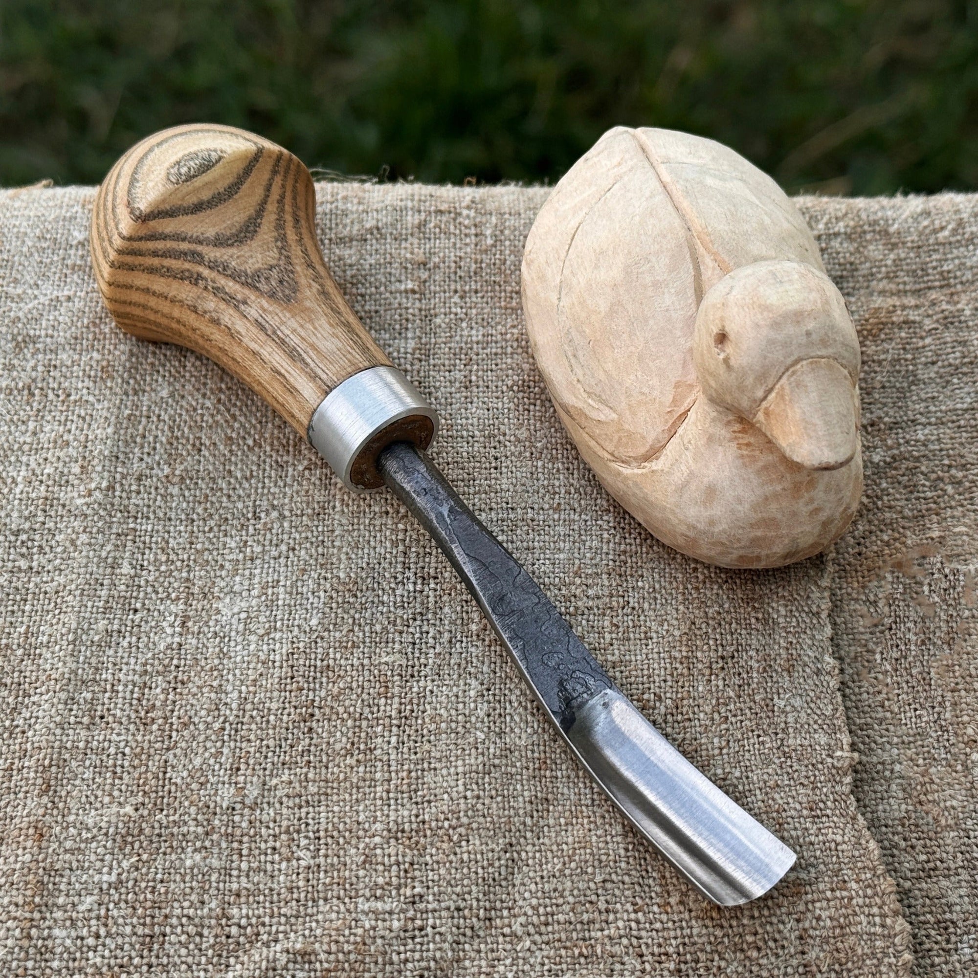 Bent carving gouge with palm handle showing 8 mm and 12 mm blade options by Sharky Forged Steel Tools