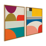 Two framed mid-century modern abstract art prints with geometric shapes in mustard yellow, coral red, teal, navy blue, olive green, and purple on cream backgrounds
