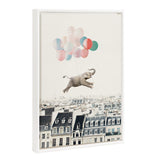 Framed canvas print showing a gray elephant lifted by pastel pink, blue, and red balloons above Parisian rooftops under a pale sky.
