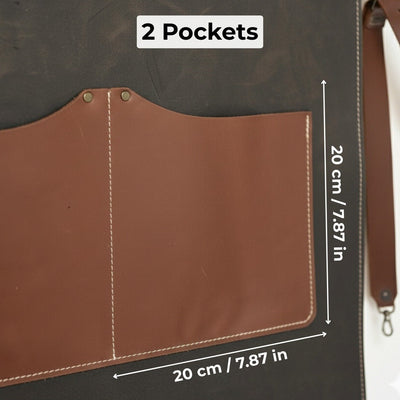 Black leather work apron with adjustable straps and large front pockets