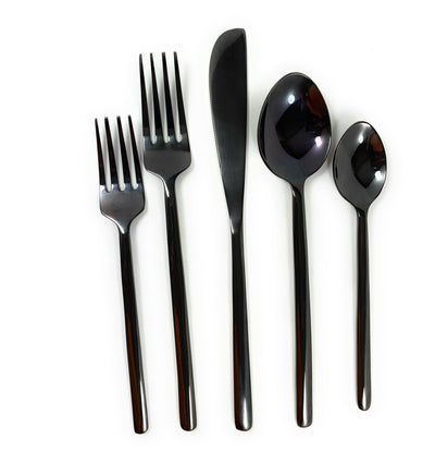 Black flatware set with knives, forks, and spoons laid out on a woven placemat