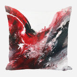 Square pillow with abstract swirling red, black, white, and gray brushstrokes blending dynamically across the surface
