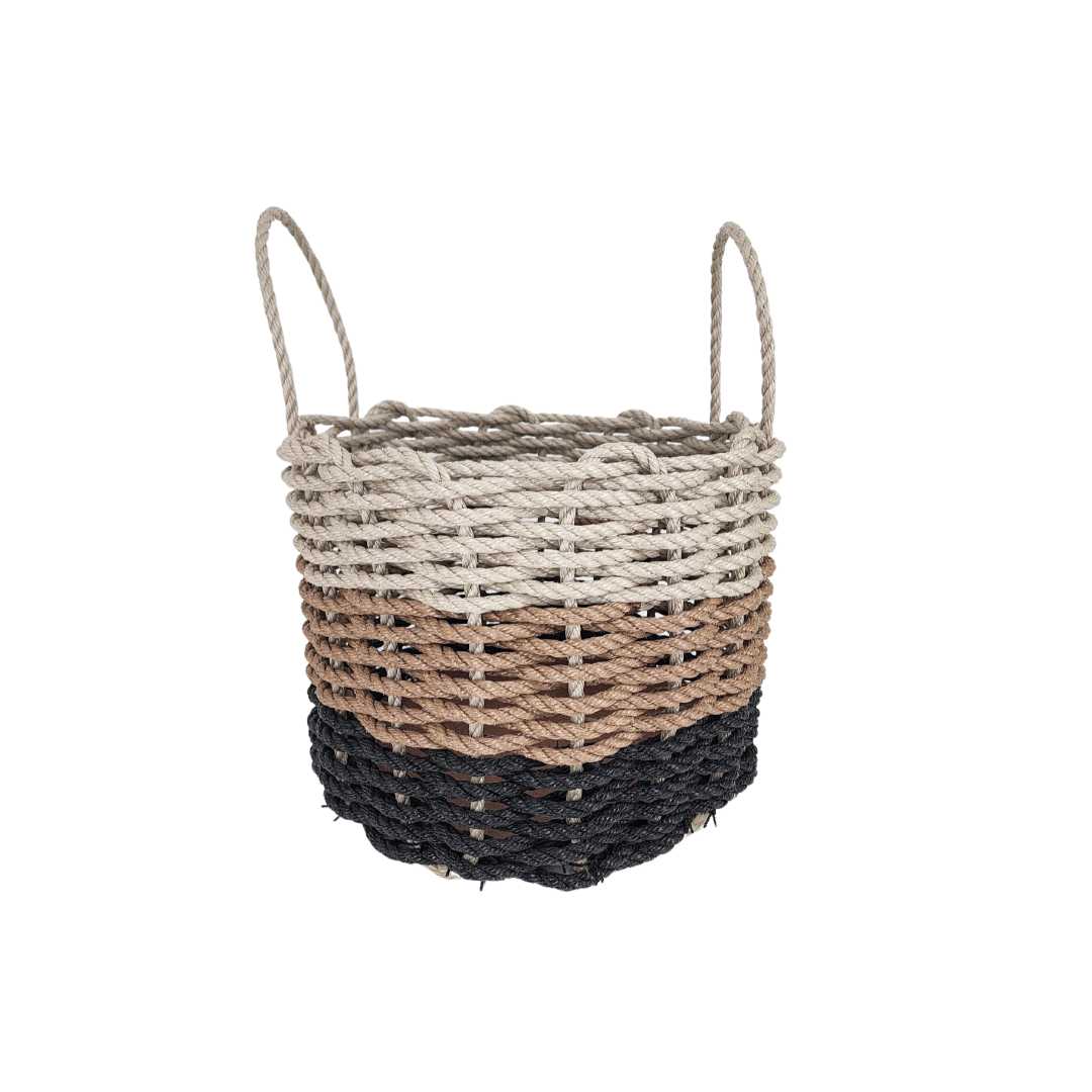 Handwoven storage basket made from black, brown, and tan ombre Maine lobster rope