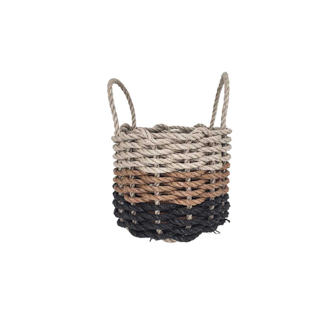 Handwoven storage basket made from black, brown, and tan ombre Maine lobster rope
