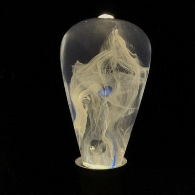 EP Light Blue-Drop Resin LED Bulb handcrafted with eco-friendly resin, shown with wooden base options