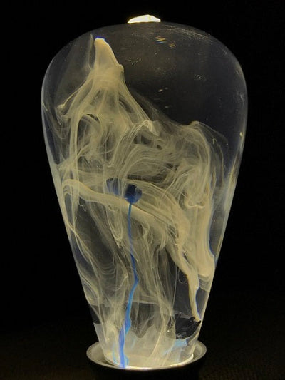 EP Light Blue-Drop Resin LED Bulb handcrafted with eco-friendly resin, shown with wooden base options