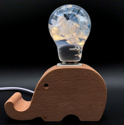 Handcrafted blue hydrangea resin LED bulb with wooden base