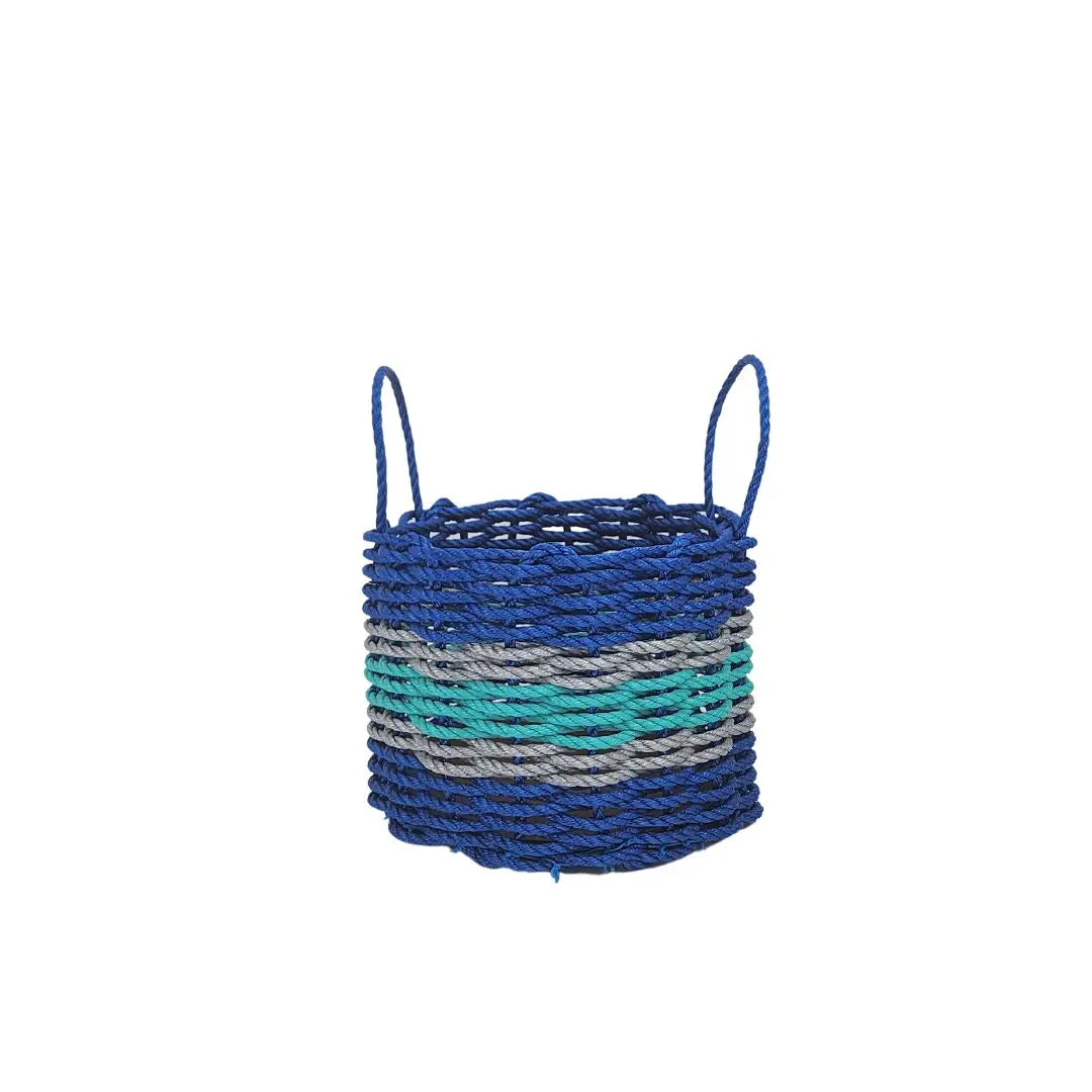 Handmade storage basket woven from blue and teal Maine lobster rope with light gray accents