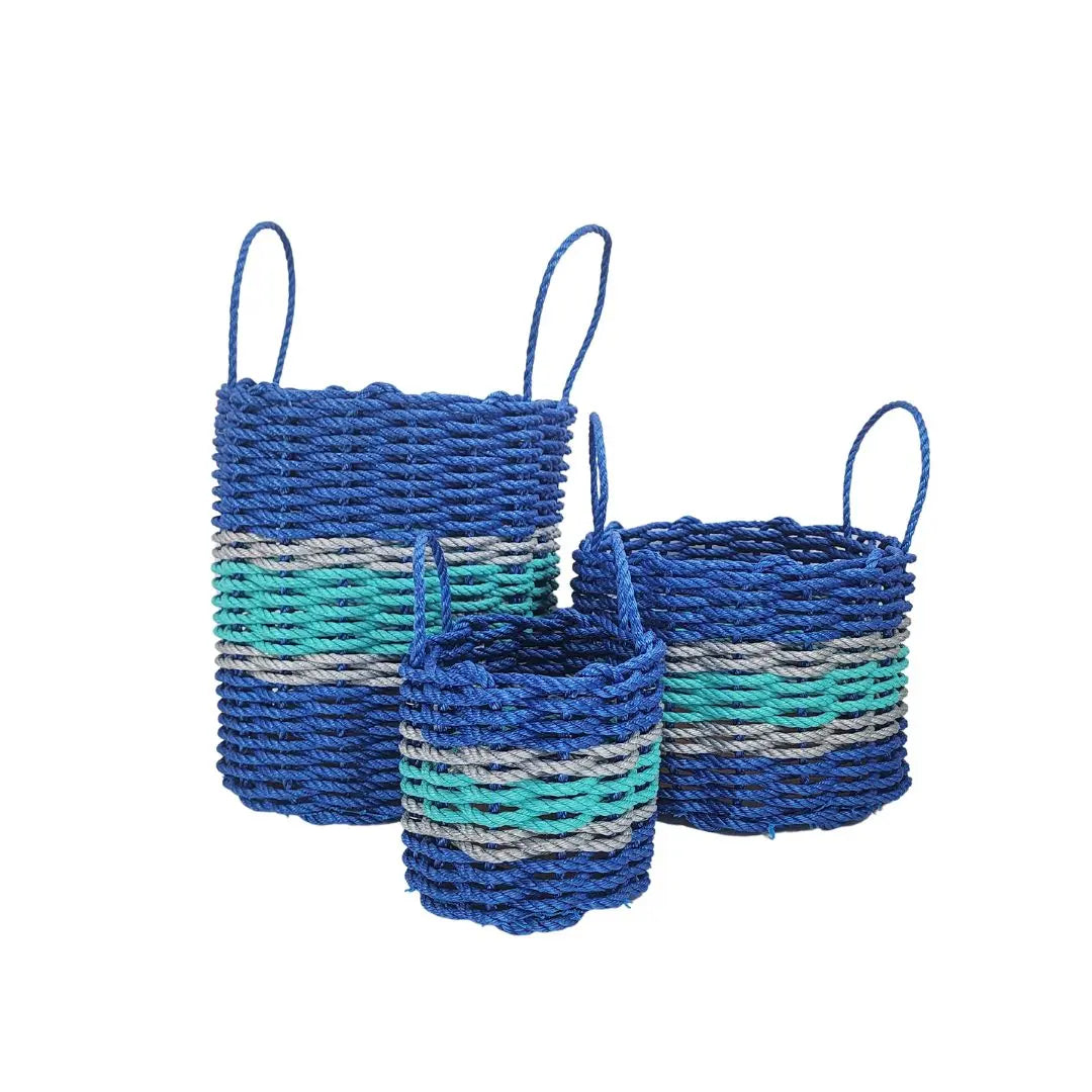 Handmade storage basket woven from blue and teal Maine lobster rope with light gray accents